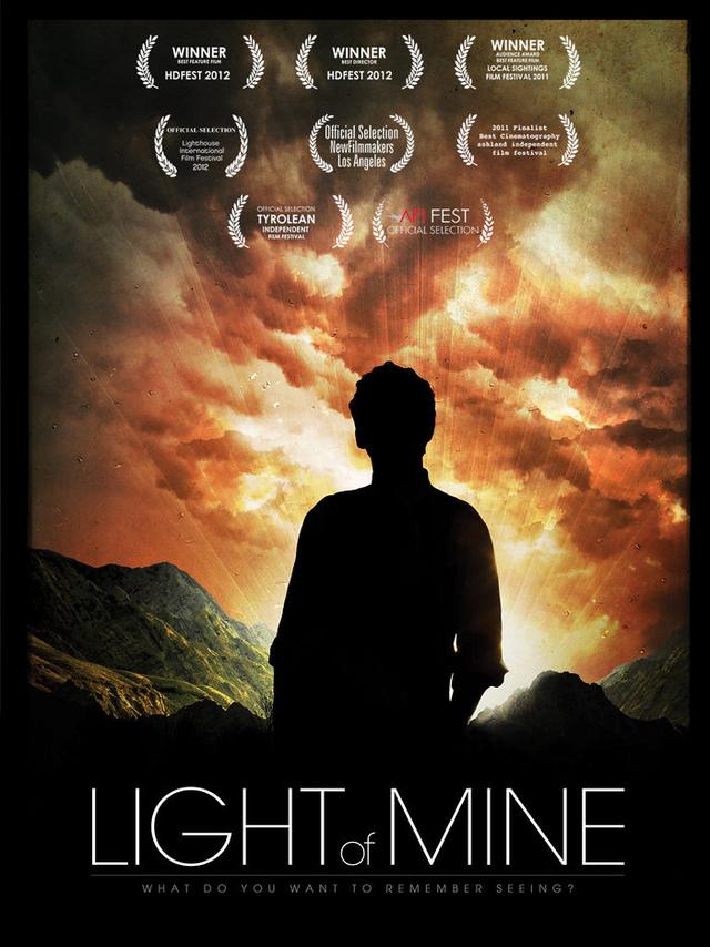 Light of Mine poster: a man silhouetted against a fiery sky.
